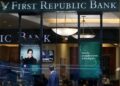 FILE PHOTO: A person walks past the First Republic Bank branch in Midtown Manhattan in New York City, New York, U.S., March 13, 2023. REUTERS/Mike Segar/File Photo