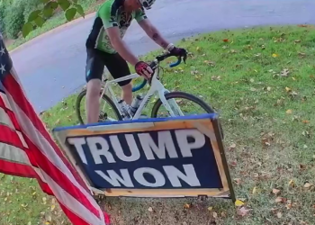 Person Kicks and Sets “Trump Won” Sign on Fire in Provocative Act