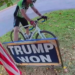 Person Kicks and Sets “Trump Won” Sign on Fire in Provocative Act