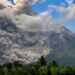 Thick smoke rises during an eruption from Mount Merapi, Indonesias most active volcano, as seen from Tunggularum village in Sleman on March 11, 2023. (Photo by DEVI RAHMAN / AFP) (Photo by DEVI RAHMAN/AFP via Getty Images)