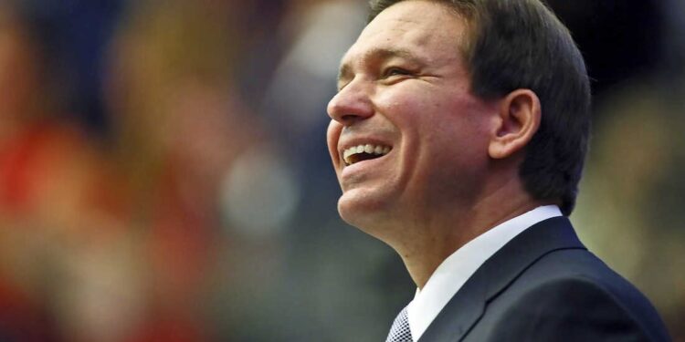 FILE - Florida Gov. Ron DeSantis smiles as he ends his State of the State address during a joint session of the Senate and House of Representatives Tuesday, March 7, 2023, at the Capitol in Tallahassee, Fla. DeSantis’ allies are gaining confidence in his White House prospects as former President Donald Trump’s legal woes mount. (AP Photo/Phil Sears, File)