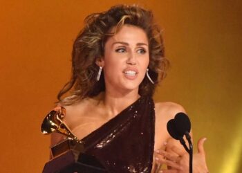 US singer-songwriter Miley Cyrus accepts the Record Of The Year award for "Flowers" on stage during the 66th Annual Grammy Awards at the Crypto.com Arena in Los Angeles on February 4, 2024. (Photo by Valerie Macon / AFP)